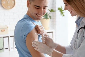 man getting his Adult immunizations
