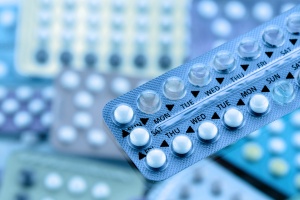 oral birth control pills stacked together