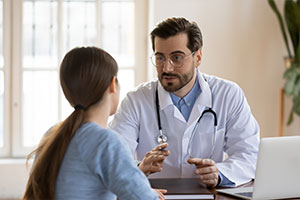 doctor talking with patient