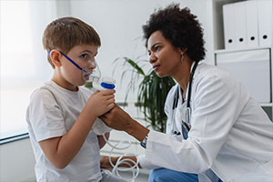 doctor helping with asthma