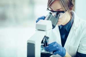 women using a on site Laboratory and microscope