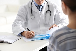 primary care provider checking the patient report