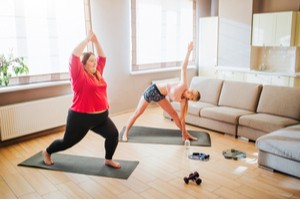 Two women working out indoors