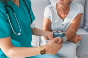 Wellness checkup of a woman by a female doctor