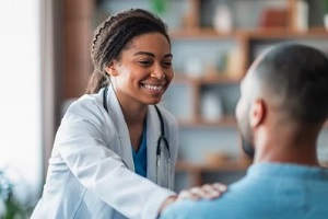 female doctor calming patient