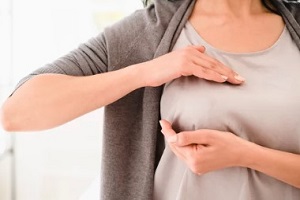 women doing breast self examination