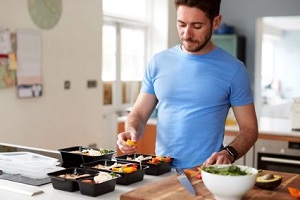 man preparing food