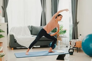 women doing exercise in room