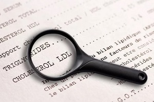 highlighting ldl cholesterol with magnifying glass