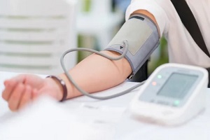 North Carolina girl measuring blood pressure