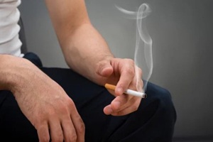 man hands having cigrette in hands