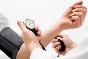 measuring blood pressure of a patient