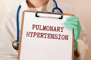 Medical Person Holding Paperclip with Inscription Pulmonary Hypertension