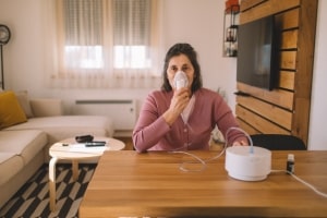 Woman Having Oxygen Therapy at Home