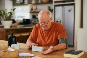 Old Man Testing Cholesterol at Home in Durham, NC