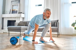 man doing exercises at home