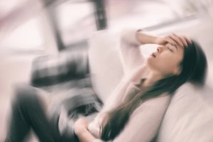 women feeling dizzy due to low blood pressure