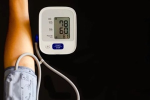 woman take care for health,using sphygmomanometer to measure blood pressure,pulse and heart rate by self