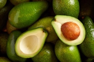 bunch of fresh avocados in the organic food market